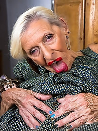French Granny Takes on a Young Stud in This Hot Porno photo
